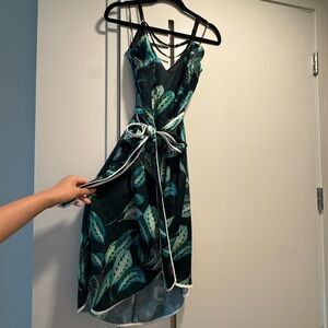 Adelyn Rae Black and Green Leaf High Low Dress